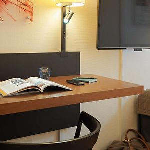 Kamer met een Queen Size Bed